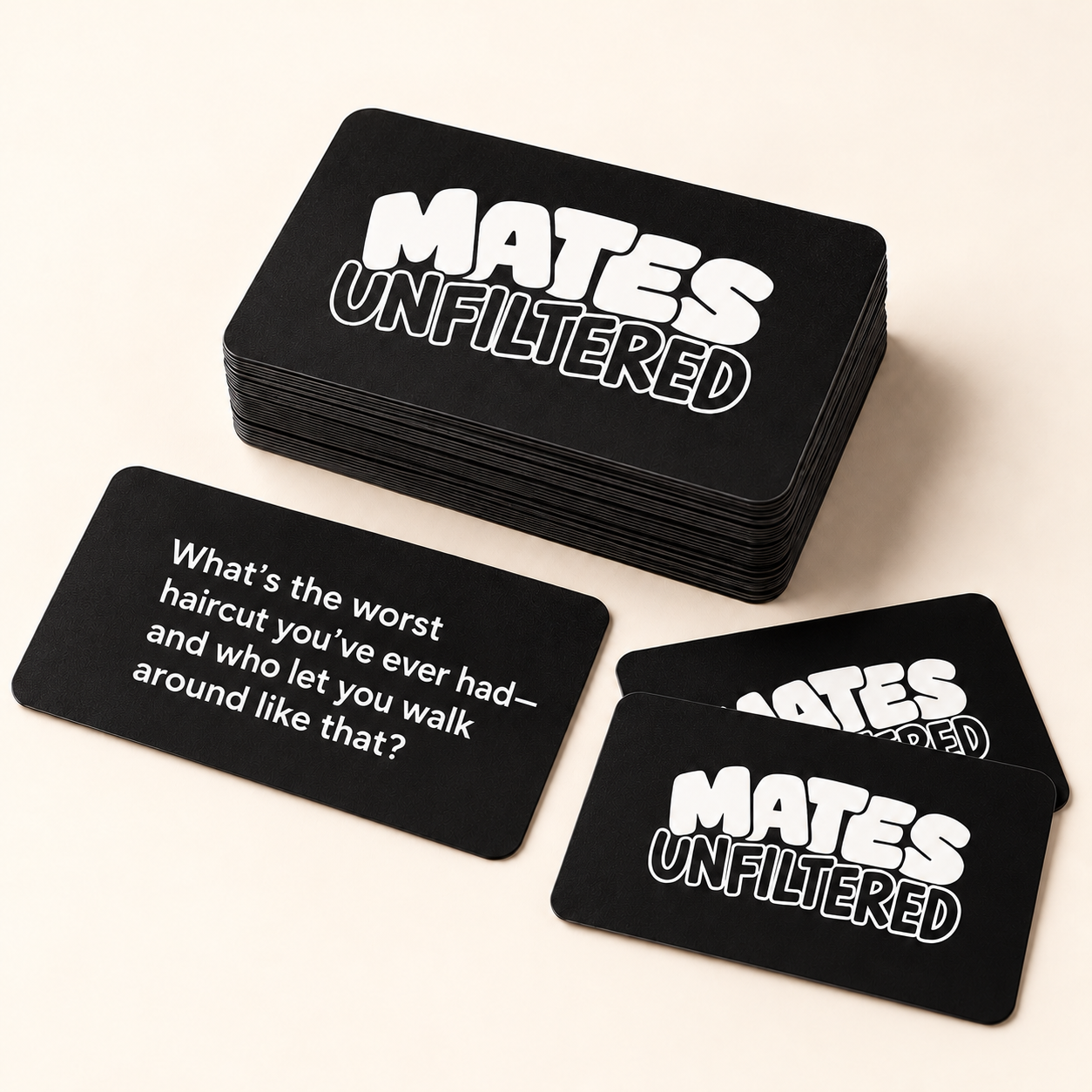 Mates Unfiltered deck of black conversation cards, with the question 'What's the worst haircut you've ever had — and who let you walk around like that?' face up